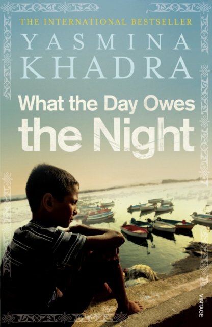 Book cover of What the Day Owes the Night