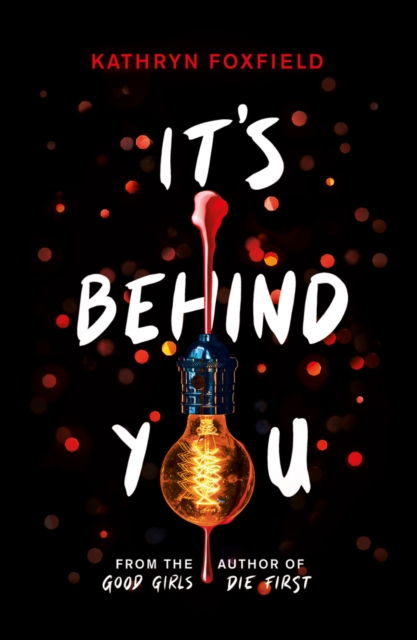 Book cover of It's Behind You