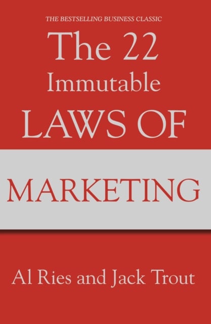 Book cover of The 22 Immutable Laws Of Marketing